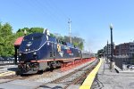 P42DC # 100 in the 50th Anniversary colors leads Amtrak Train # 682 out of Haverhill Station 